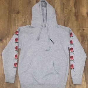 Grey Obey hoodie with rose accents